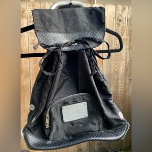 Black and metal back pack